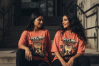 Offline Mode tee Coral two female models sitting on steps