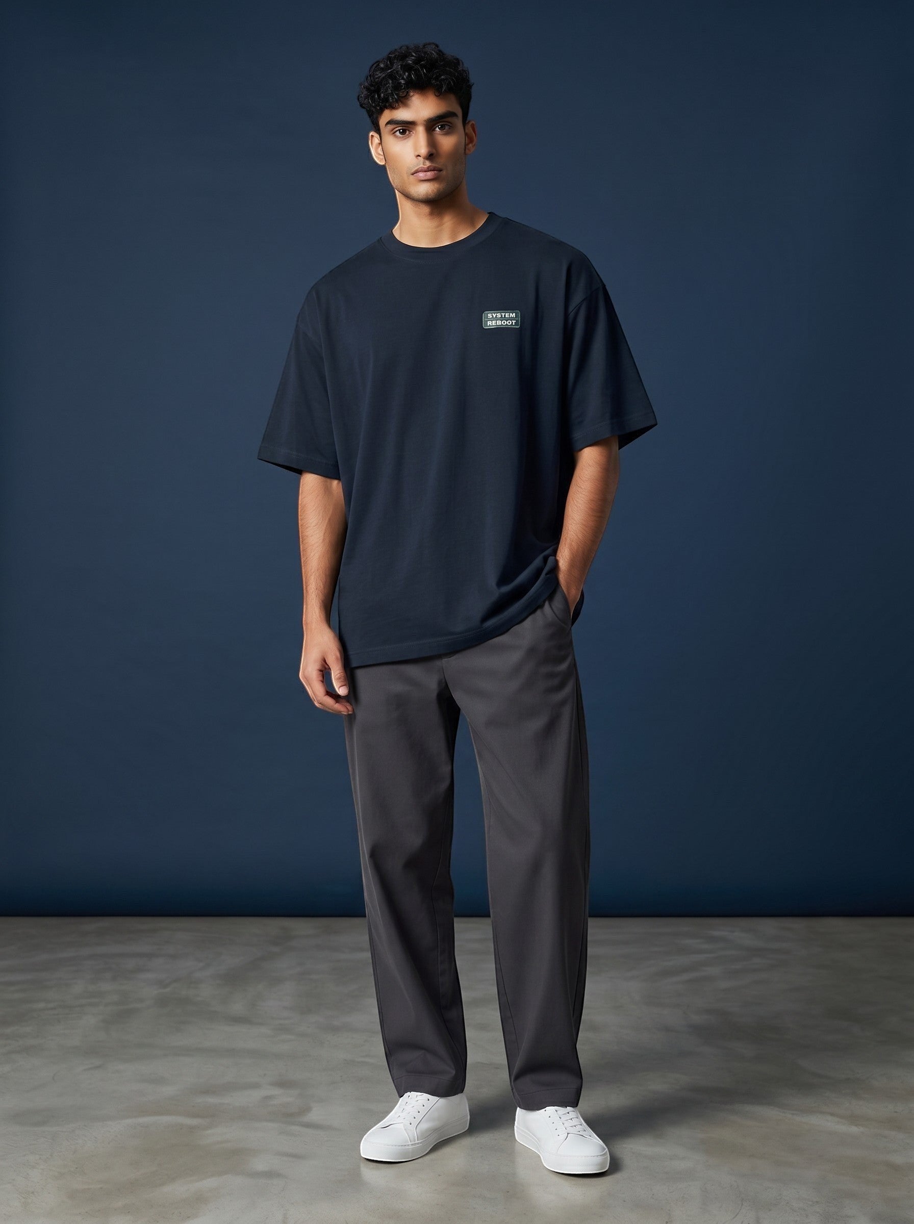 vcreate4uhub.co.in navy oversized cotton t-shirt with chest logo and graphic print on back.