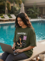 vcreate4uhub.co.in olive green graphic t-shirt with "Manifesting" text and motivational graphics about dreams and achievement.