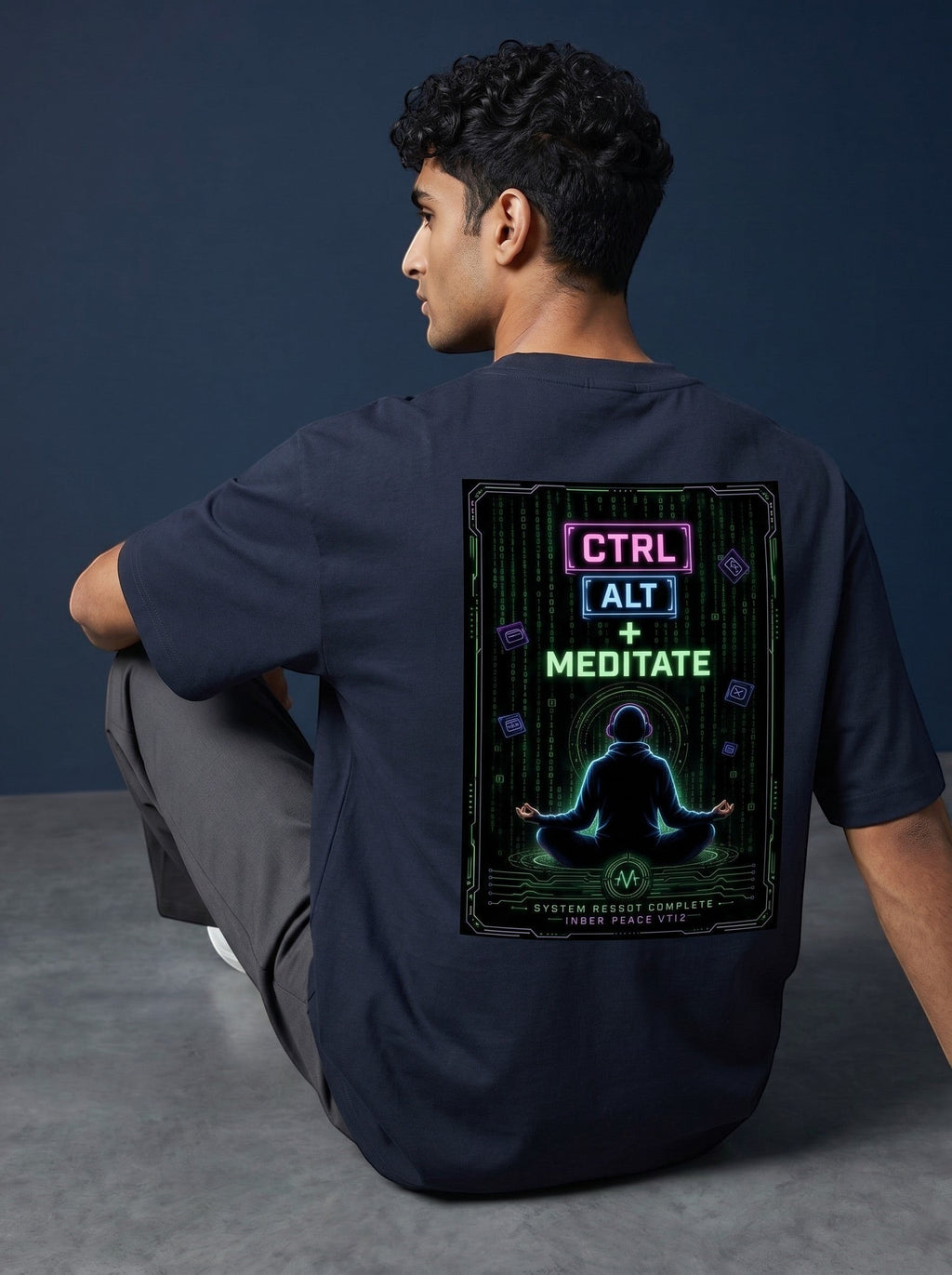 vcreate4uhub.co.in navy oversized cotton t-shirt with 'CTRL ALT + MEDITATE' graphic print on back.