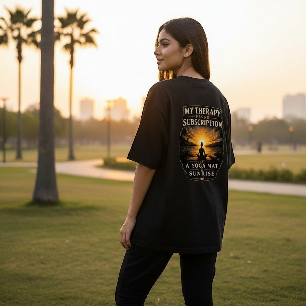vcreate4uhub.co.in black t-shirt with "My Therapy Has No Subscription Just A Yoga Mat And Sunrise" graphic on back.