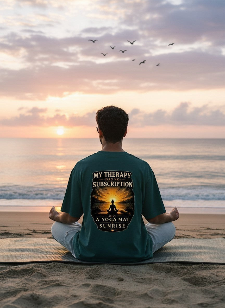 vcreate4uhub.co.in dark teal t-shirt with "My Therapy Has No Subscription Just A Yoga Mat & Sunrise" graphic on back.